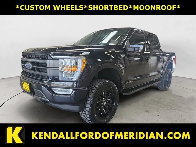 Used 2023 Black Metallic Ford Lariat image 1