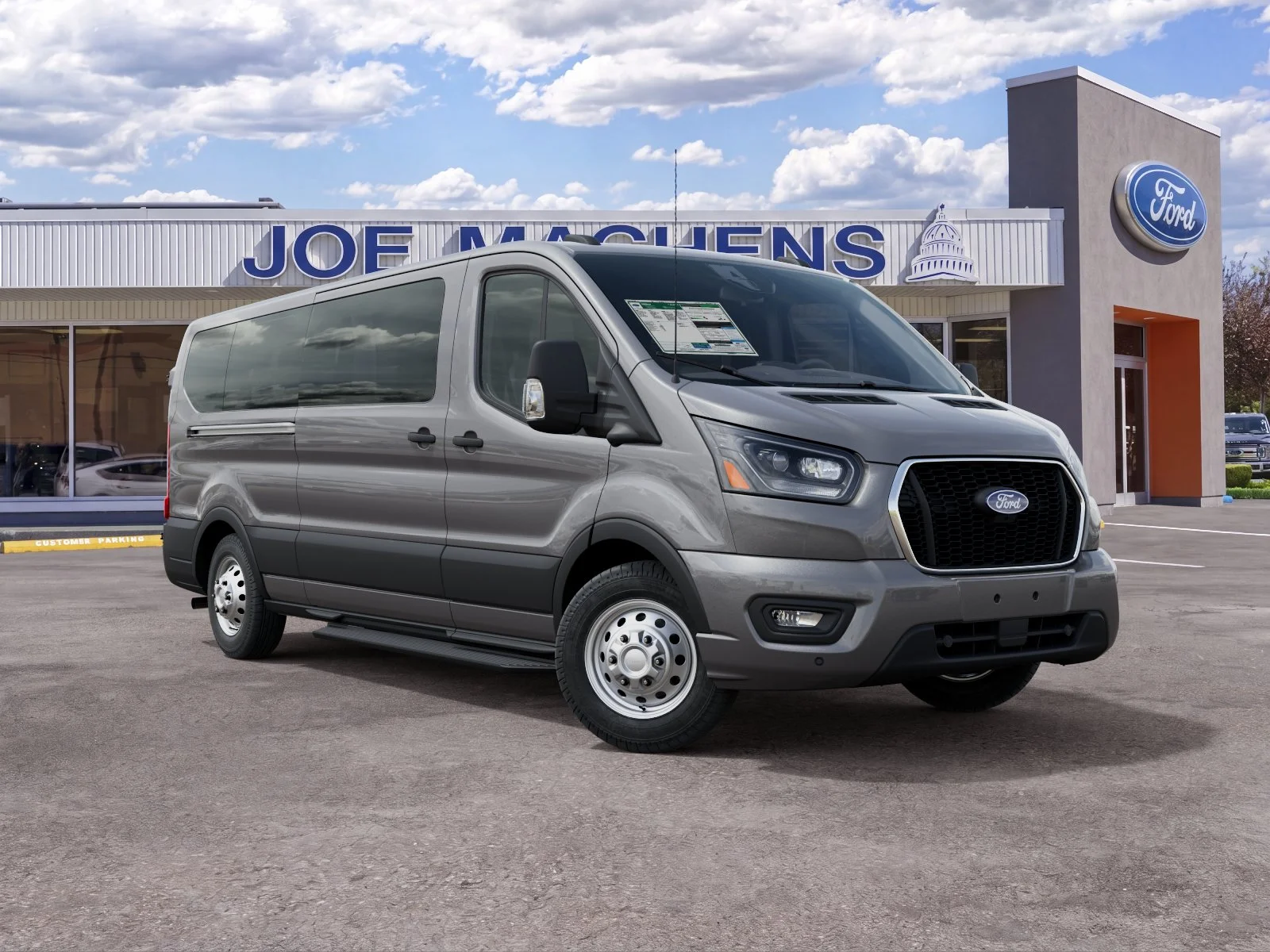 New 2027 Carbonized Gray Metallic Ford Passenger Van XLT image 1