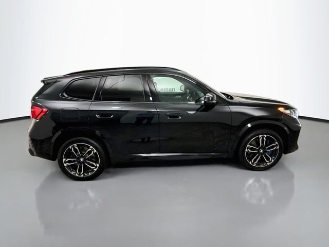 Used 2026 Black Sapphire Metallic BMW M35i image 8