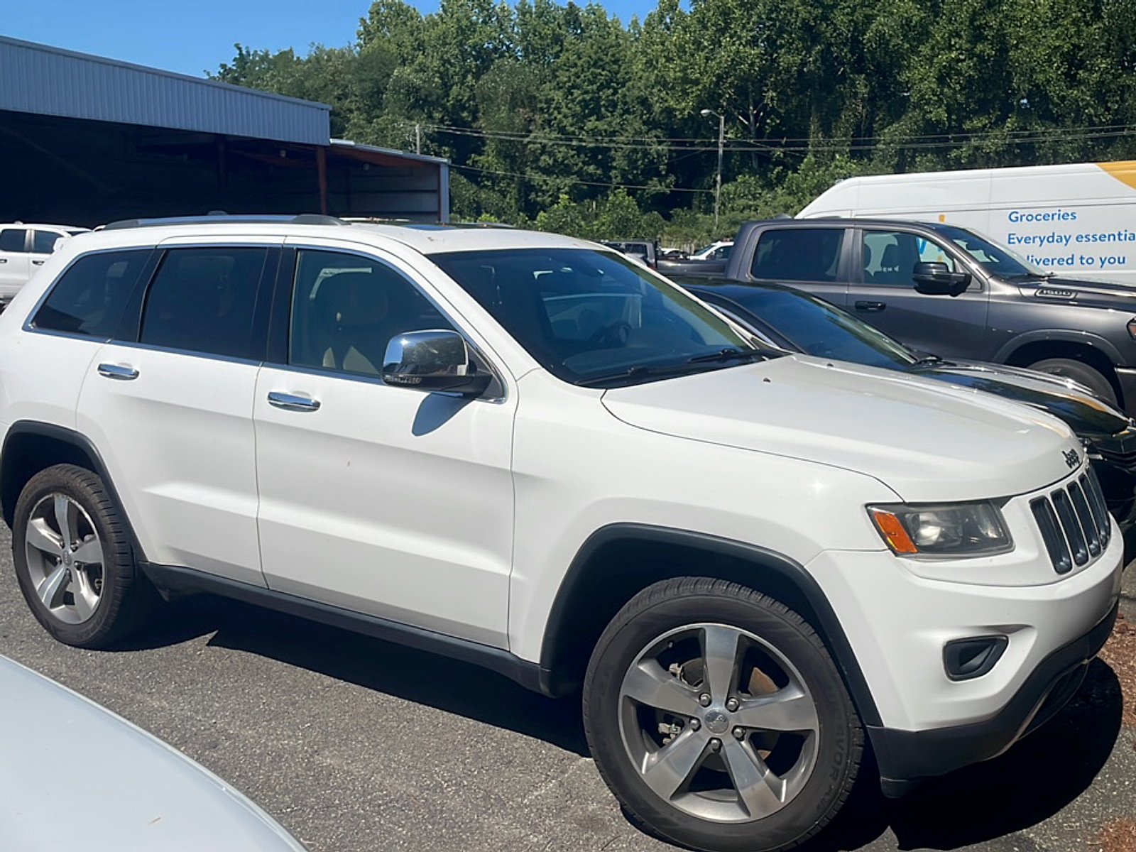Used 2016 Bright White Clearcoat Jeep Limited image 1