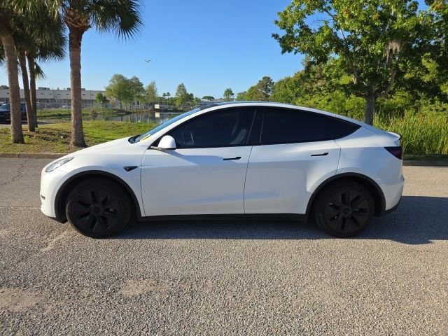 Used 2025 Tesla Model Y Long Range with VIN 7SAYGDEE1SA363809 for sale in Sarasota, FL