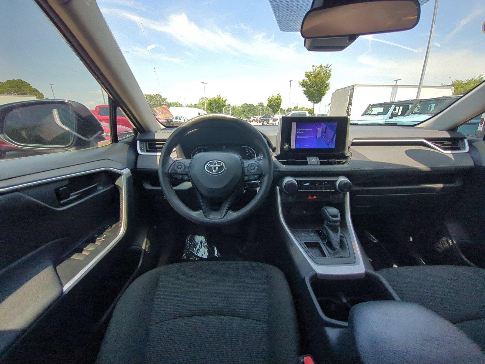 Used 2023 Magnetic Gray Metallic Toyota LE image 32
