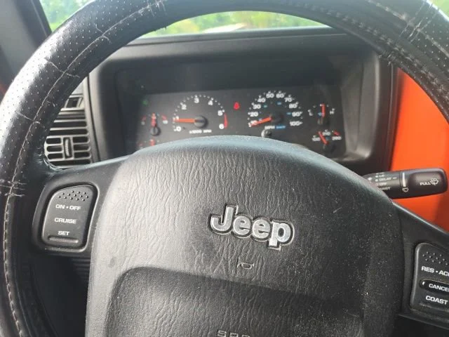 Used 2005 Impact Orange Cle Jeep Sport image 35