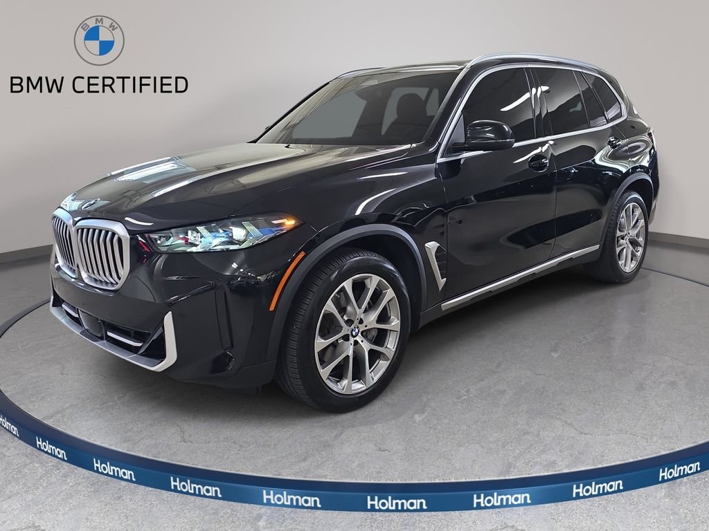 Certified Used 2024 Black Sapphire Metallic BMW xDrive40i image 1