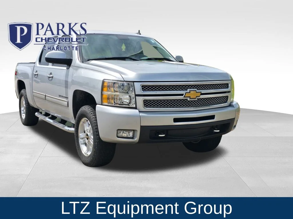 Used 2013 Silver Chevrolet LTZ image 1