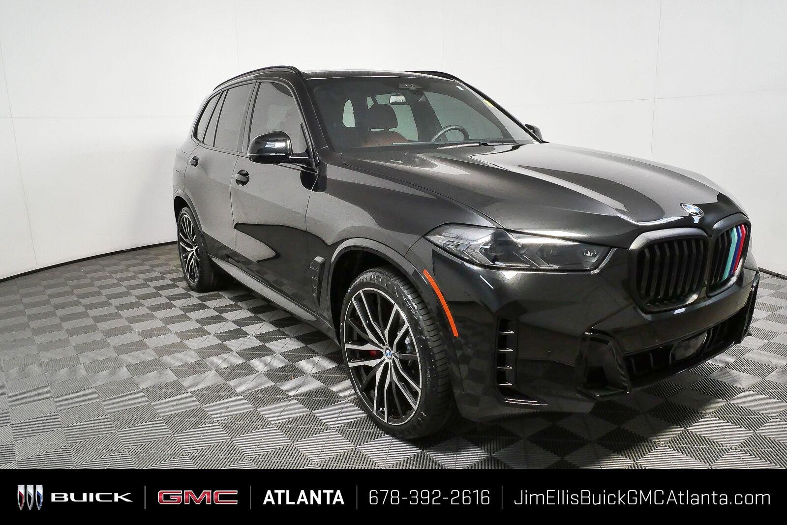 Used 2024 Black Sapphire Metallic BMW xDrive40i image 1