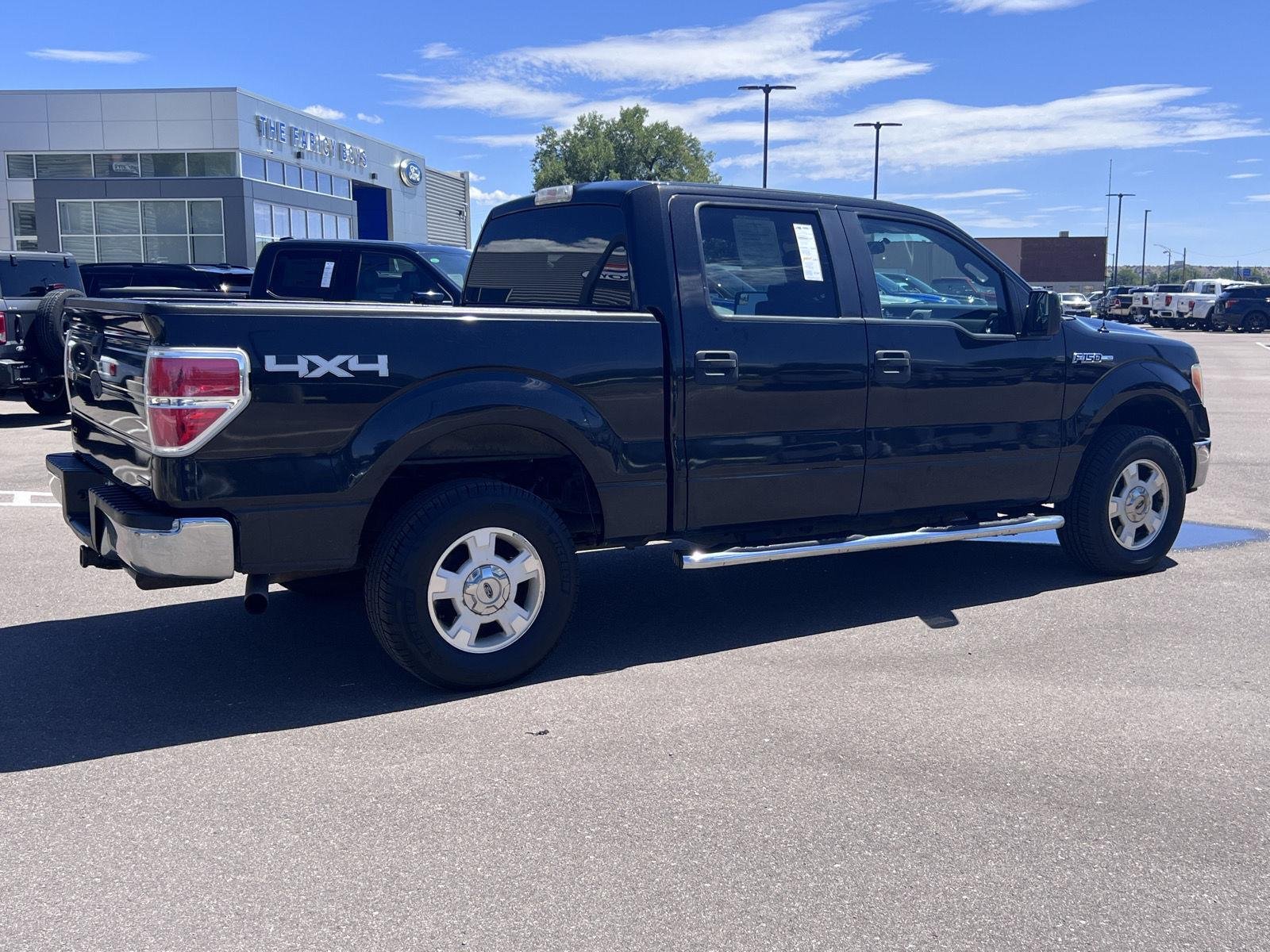 Used 2011 Tuxedo Black Metallic Ford XLT image 5
