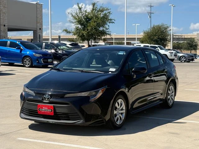 Used 2025 Midnight Black Metallic Toyota LE image 7