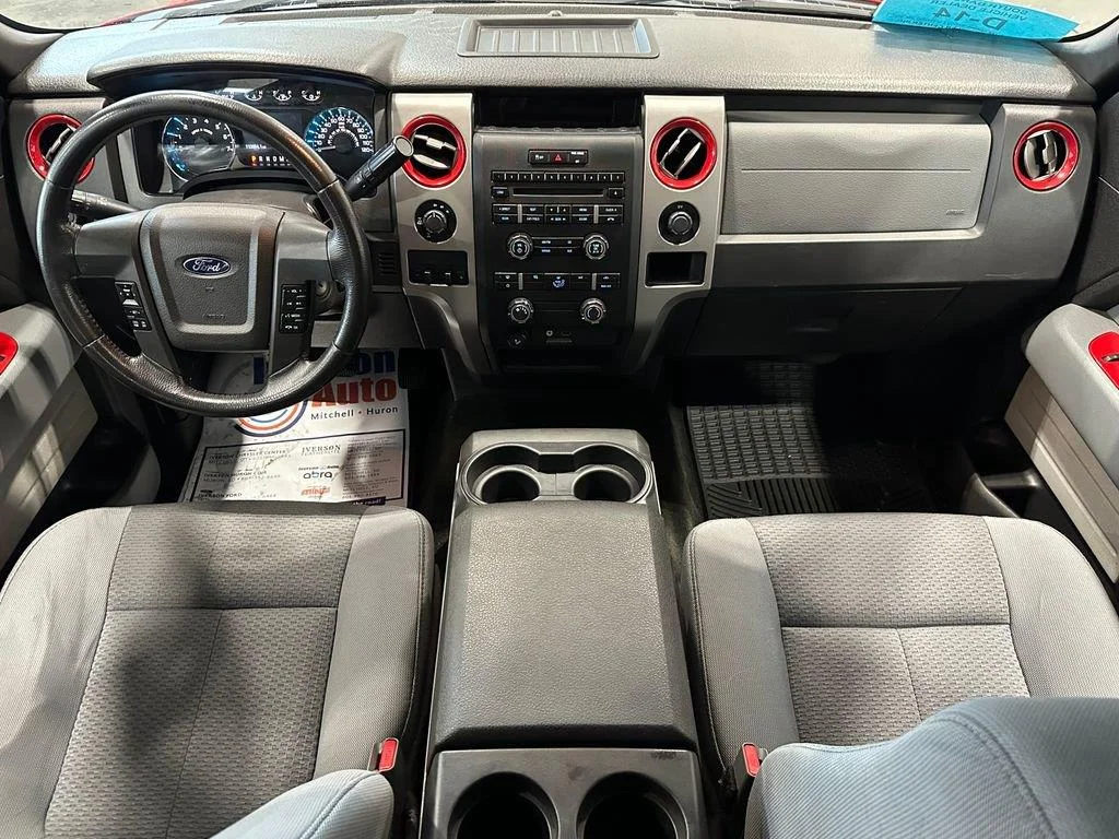 Used 2012 Race Red FORD 4WD SUPERCREW 145