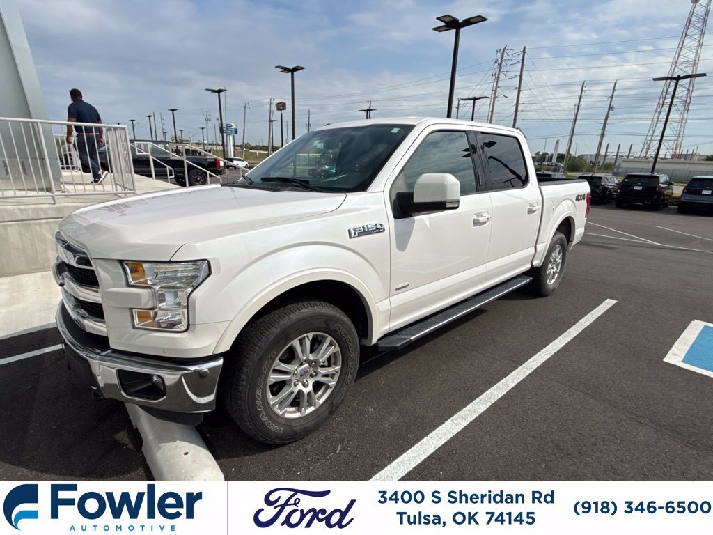 Used 2015 White Ford Lariat image 1