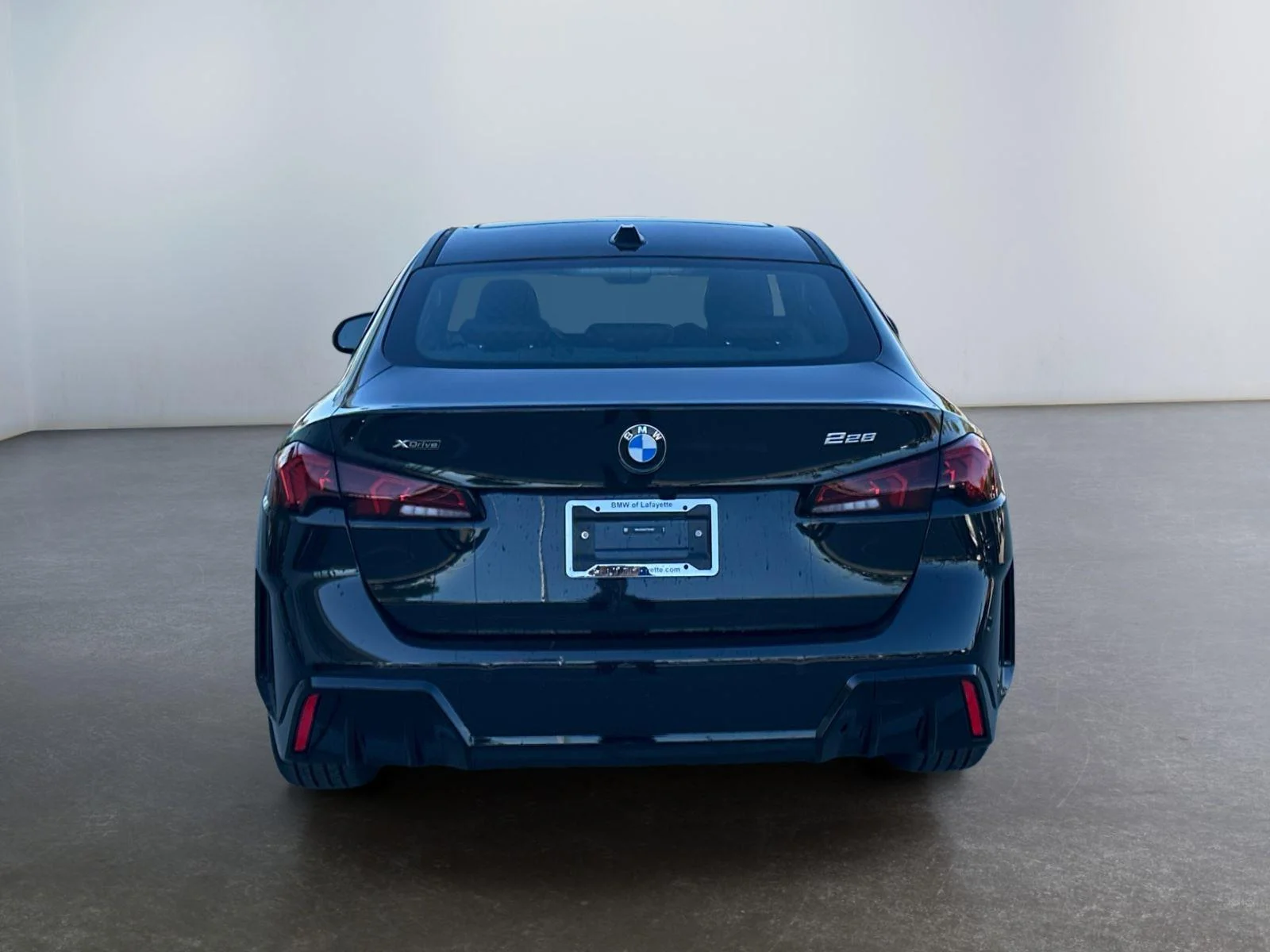 Used 2026 Black Sapphire Metallic BMW 228 xDrive image 4