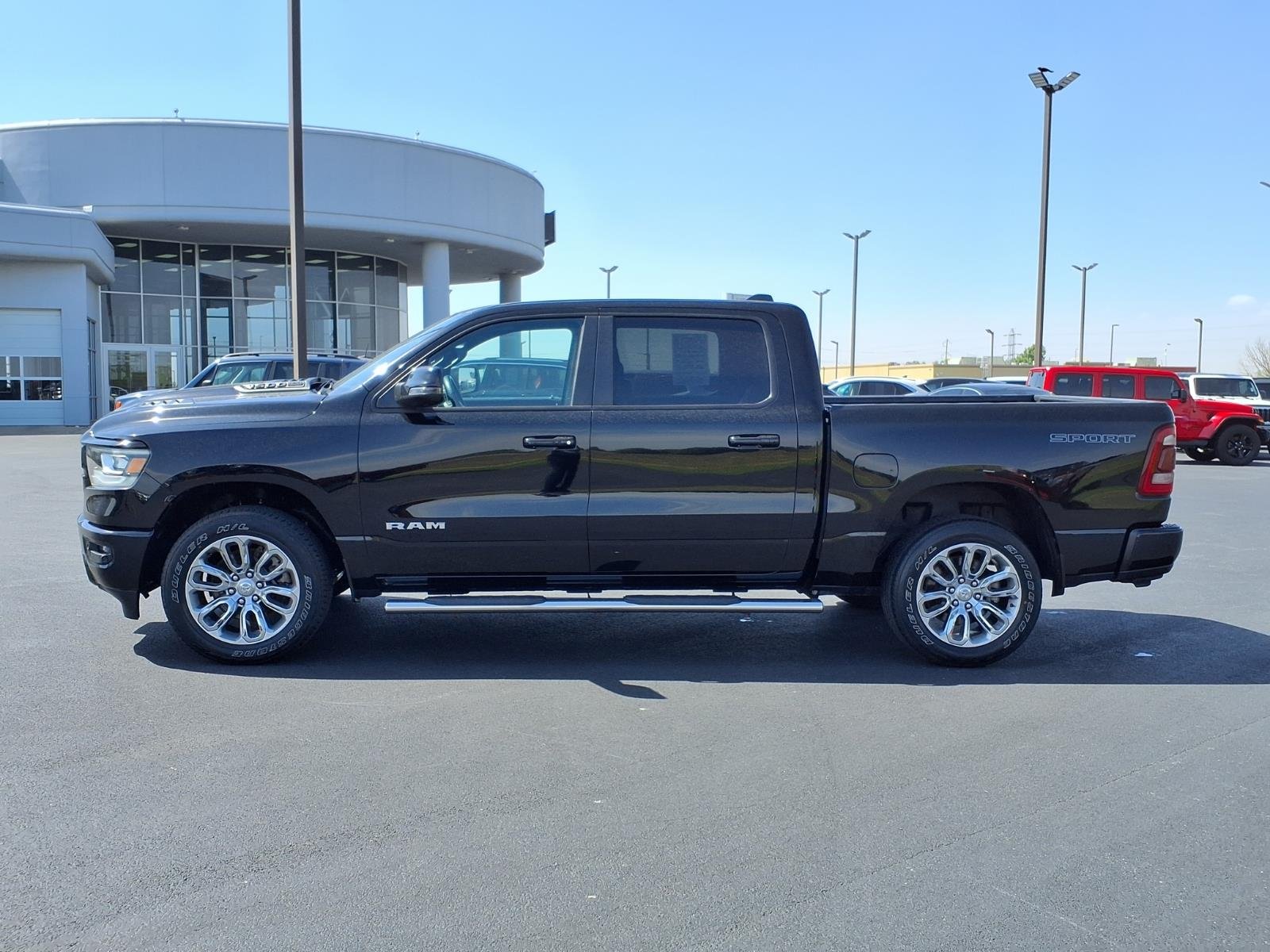 Used 2023 Diamond Black Crystal Pearl Coat RAM Laramie image 16