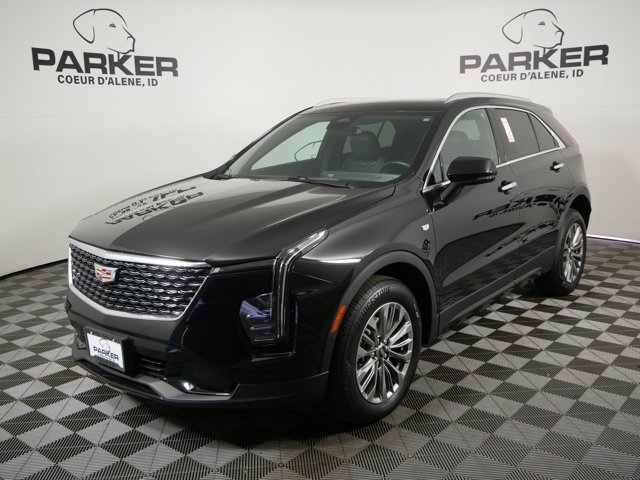 Used 2024 Stellar Black Metallic Cadillac AWD Premium Luxury image 1