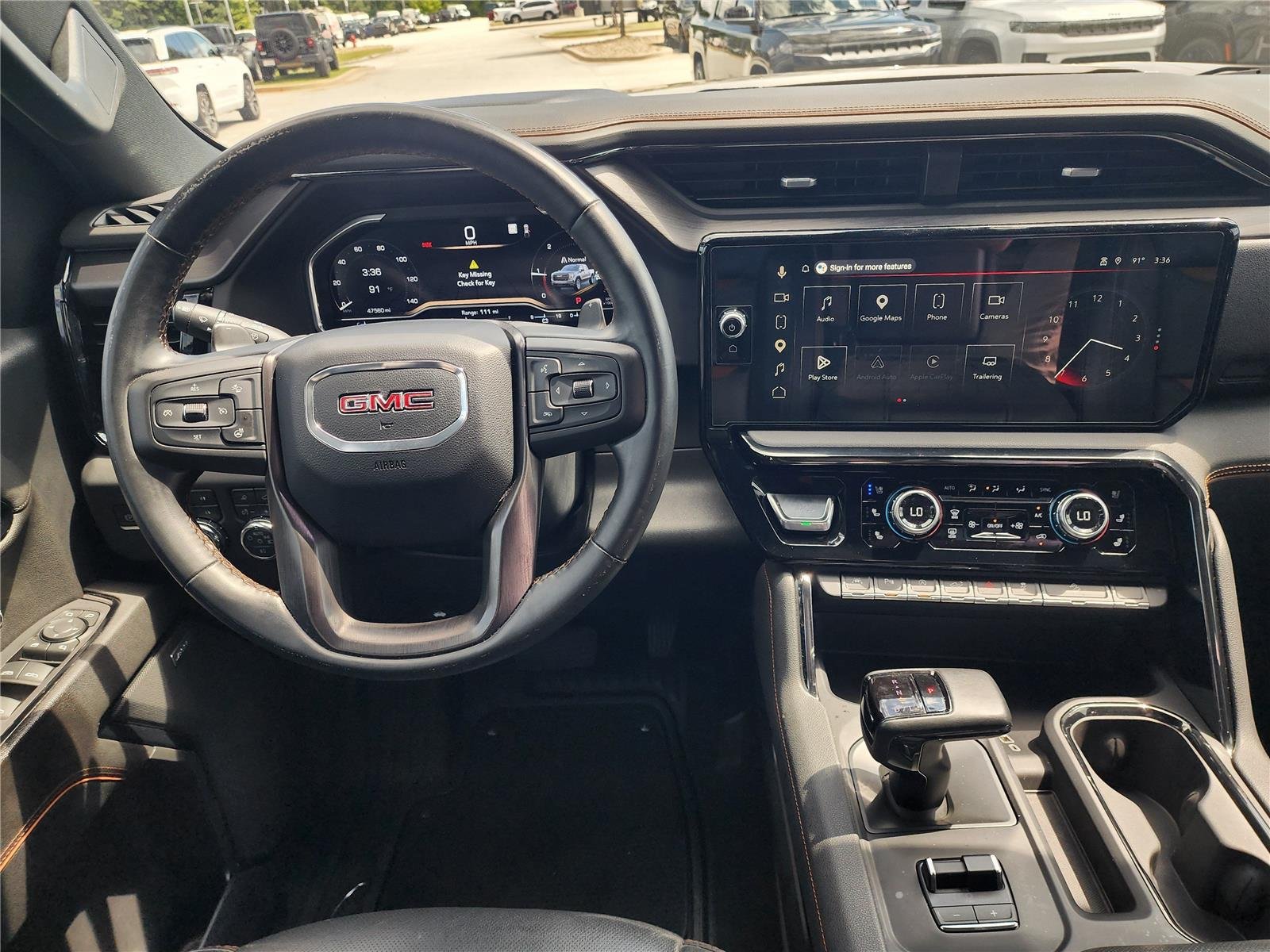 Used 2023 Desert Sand Metallic GMC AT4 image 11