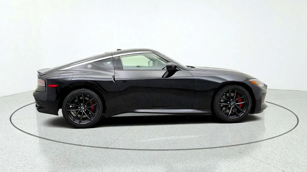 Used 2024 Black Diamond Pearl Nissan Performance Automatic image 4