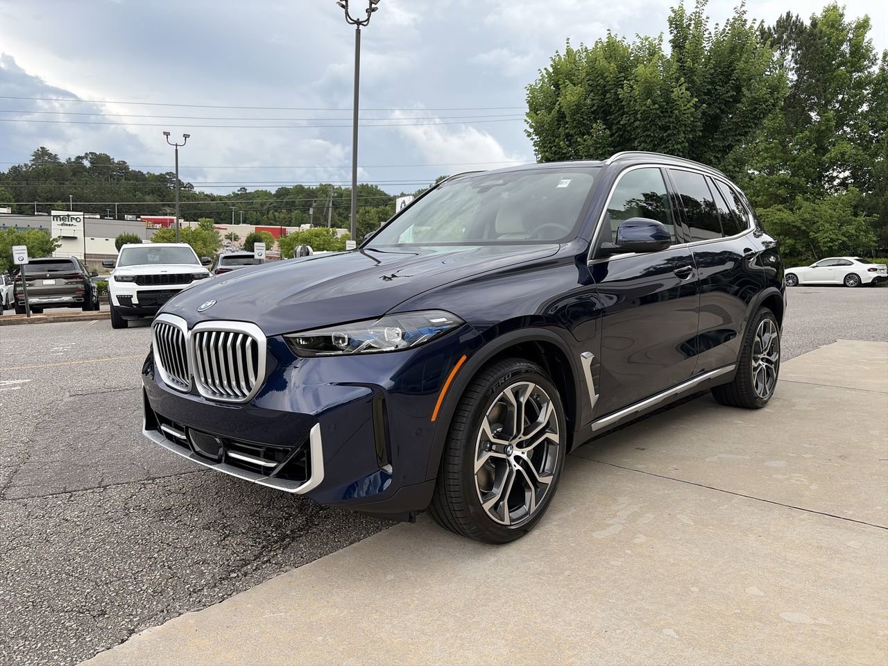 New 2026 Tanzanite Blue II Metallic BMW xDrive50e image 4