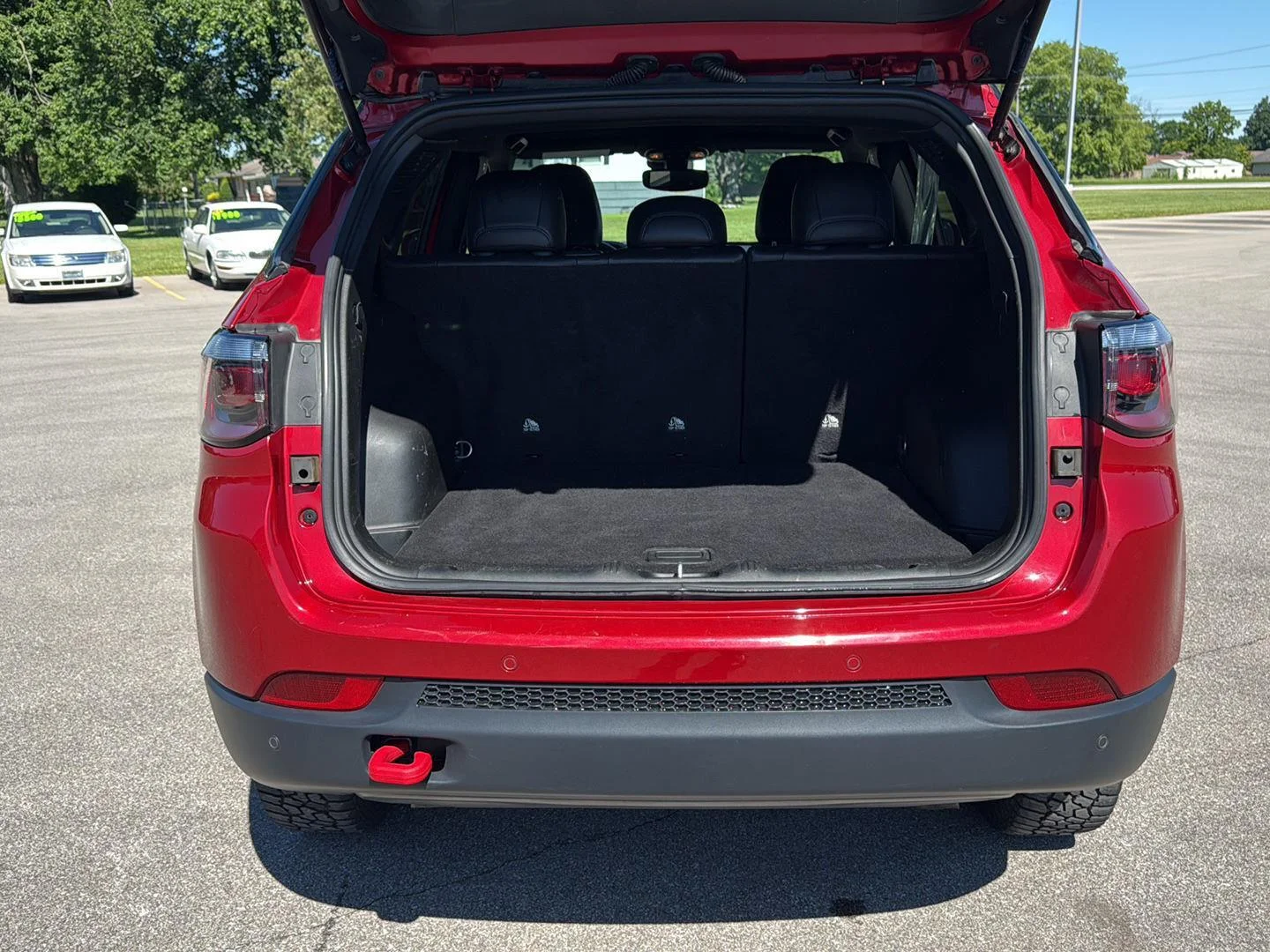 Used 2025 Red Hot Pearlcoat Jeep Trailhawk image 7