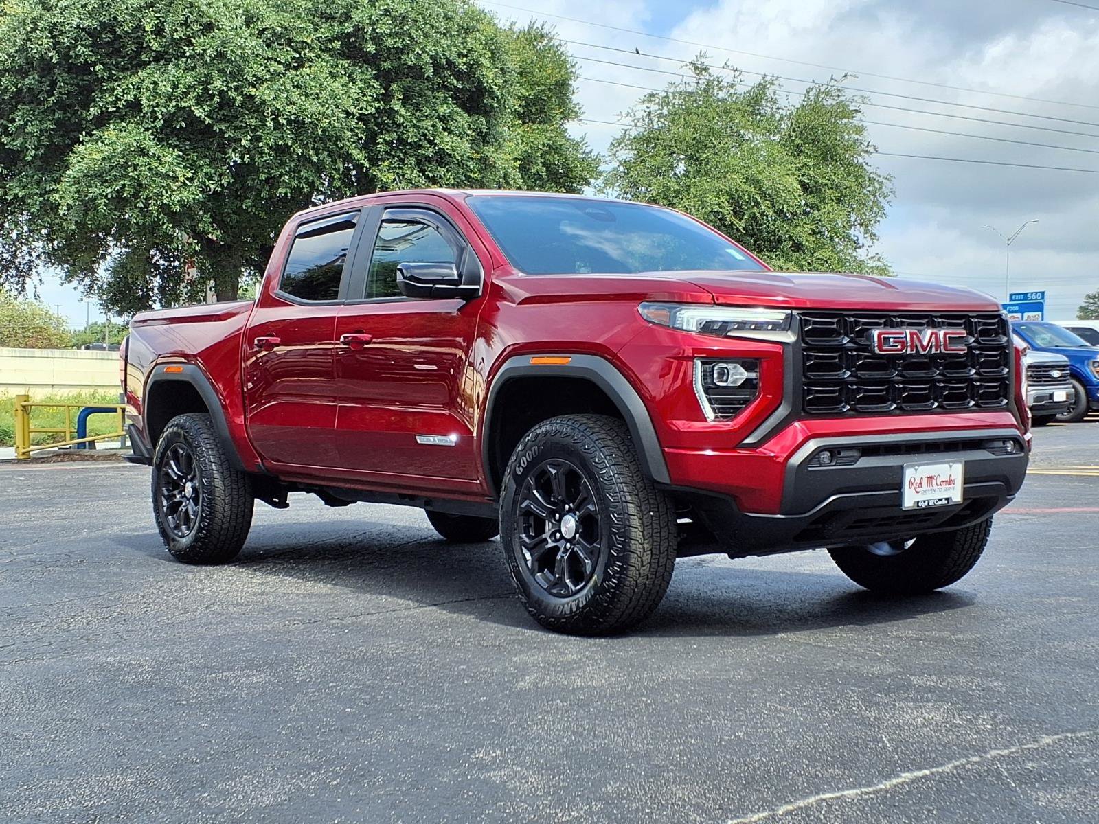 Used 2024 Volcanic Red Tintcoat GMC 2WD Elevation image 3