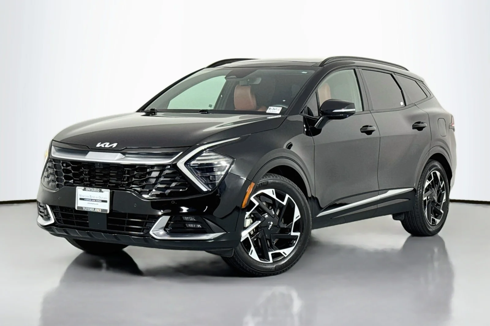 Used 2023 Ebony Black Kia SX-Prestige FWD image 1