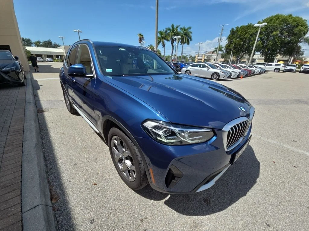 Used 2024 Blue BMW xDrive30i image 1