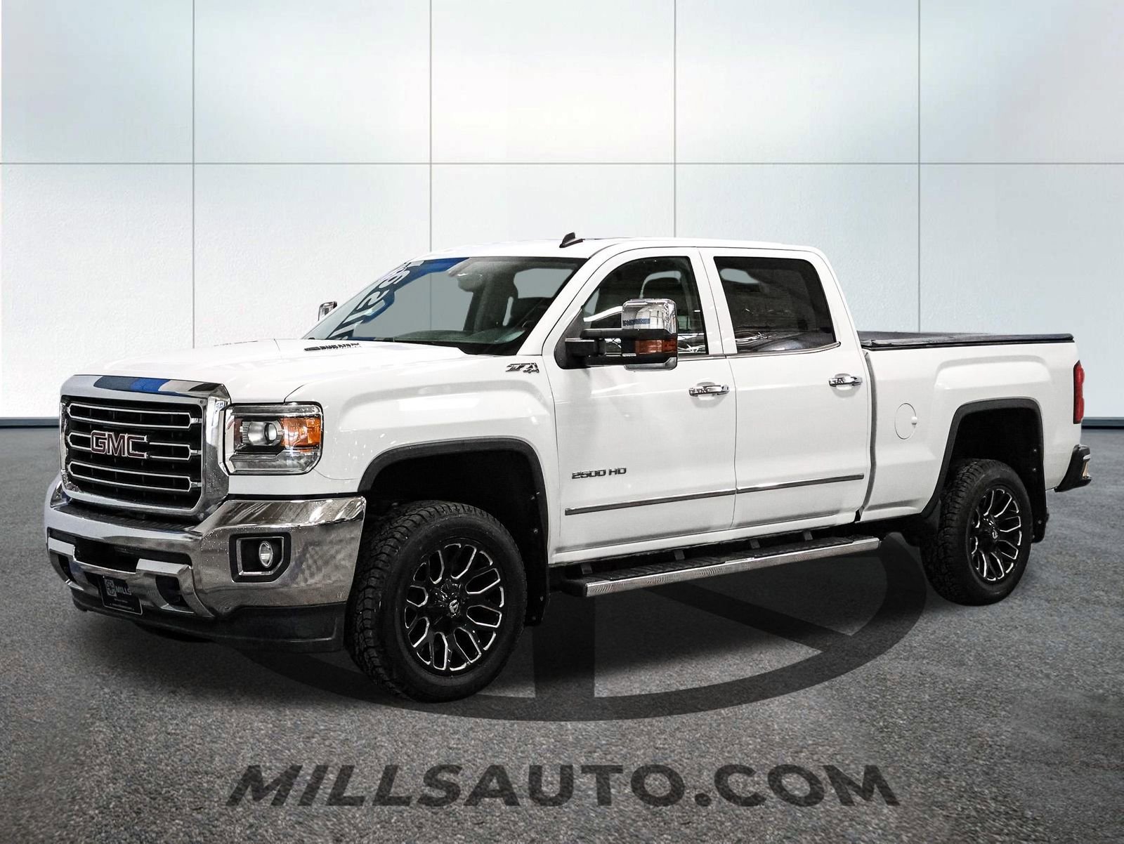 Used 2015 GMC Sierra 2500HD SLT with VIN 1GT12ZE87FF120188 for sale in Baxter, Minnesota