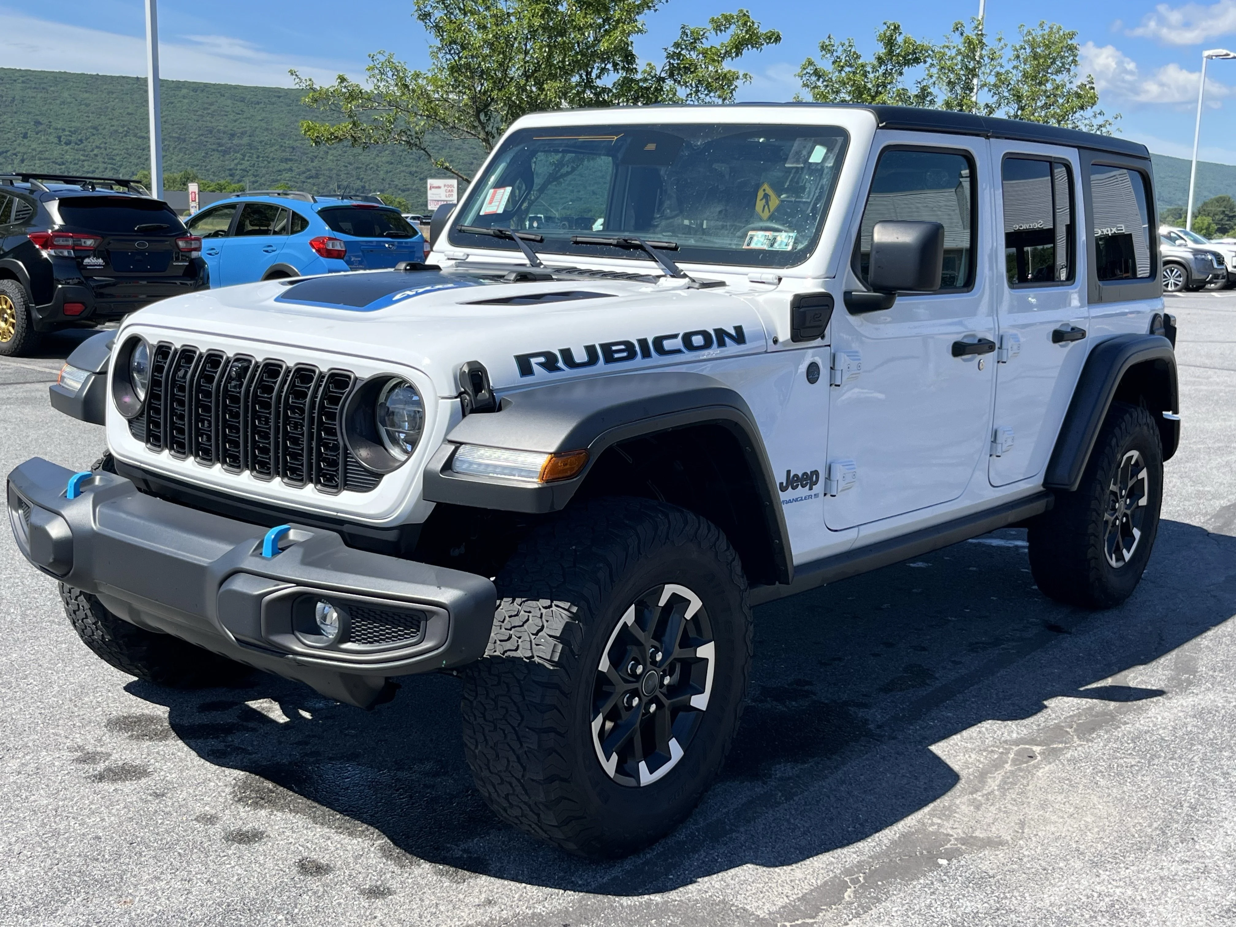 Used 2024 Bright White Clearcoat Jeep Rubicon 4xe image 9