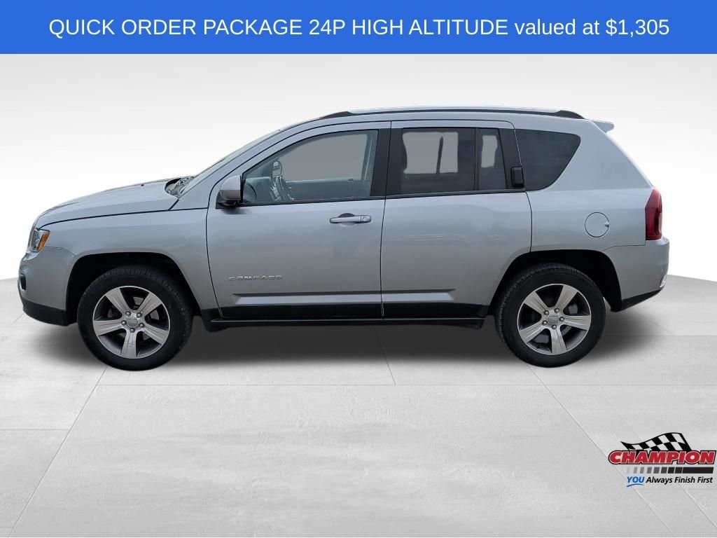 Used 2017 Jeep Compass High Altitude with VIN 1C4NJCEA1HD130492 for sale in Lansing, MI