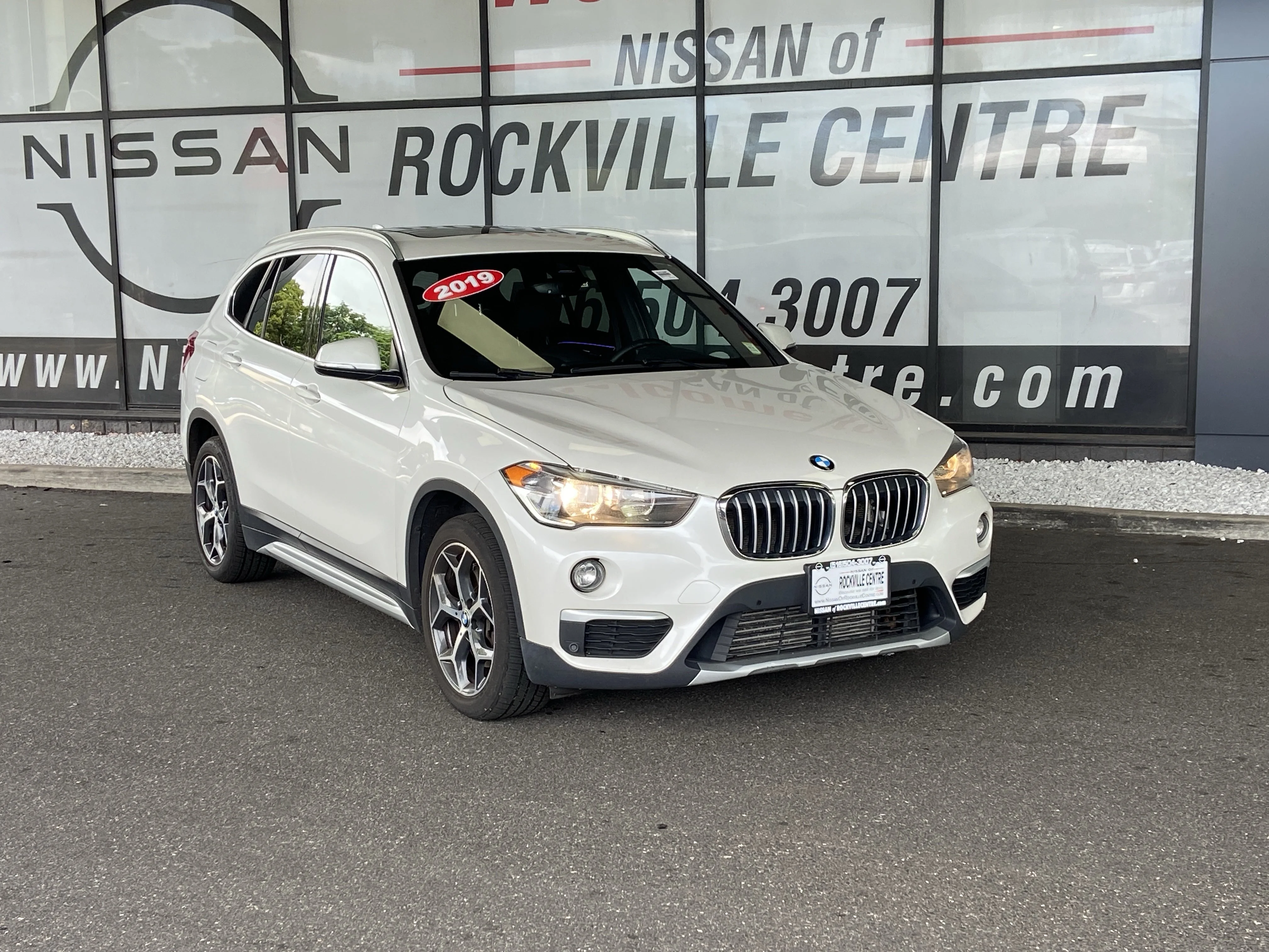 Used 2019 BMW X1 28i with VIN WBXHT3C57K5L97931 for sale in Rockville Centre, NY