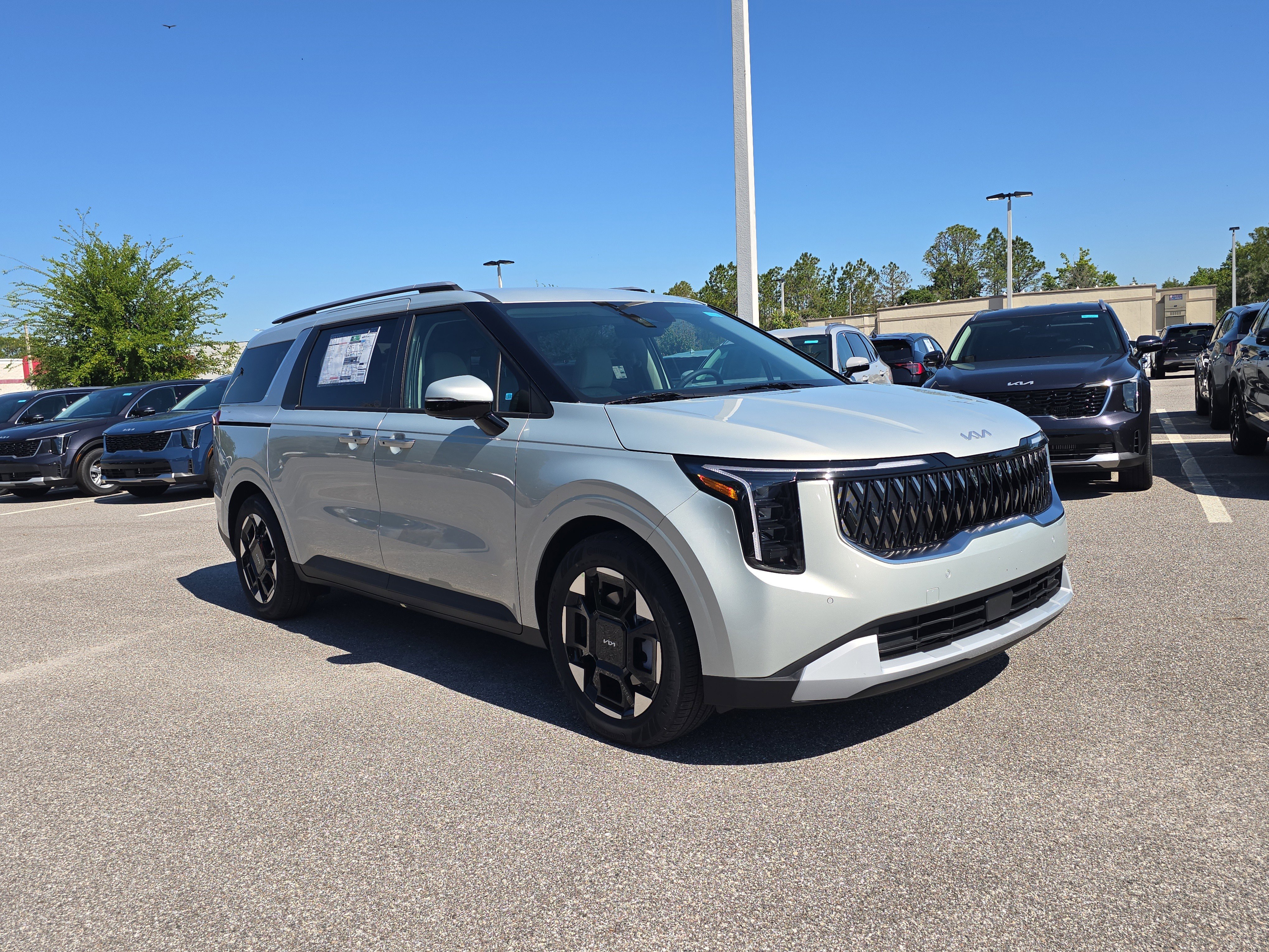 New 2026 Ivory Silver Kia EX image 2