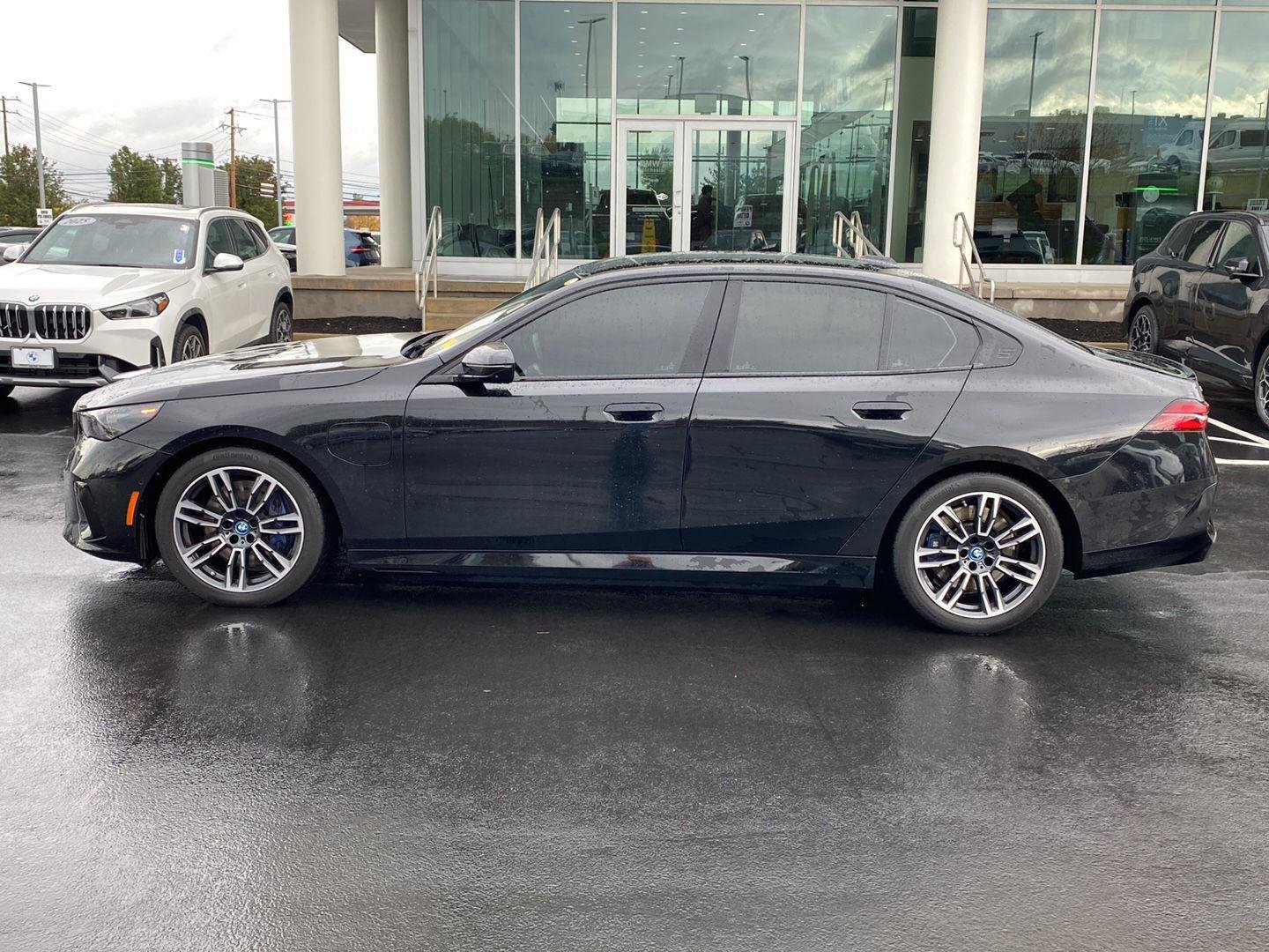 Used 2025 Black Sapphire Metallic BMW 550e xDrive image 6