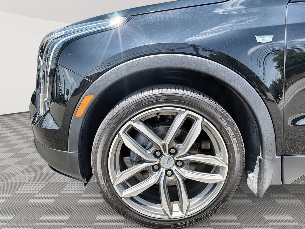 Used 2022 Stellar Black Metallic Cadillac Sport image 19