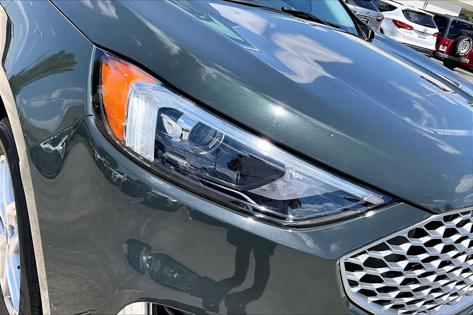 Used 2024 Forged Green Metallic Ford SEL image 25
