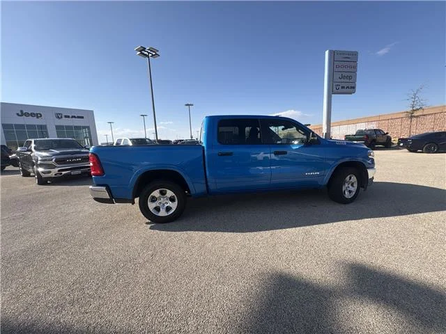 Used 2025 Hydro Blue Pearlcoat RAM Big Horn/Lone Star 4x4 Crew Cab 144.5 in. WB image 8