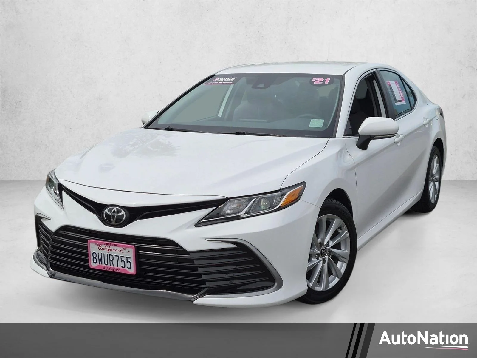 Used 2021 Super White Toyota LE image 1