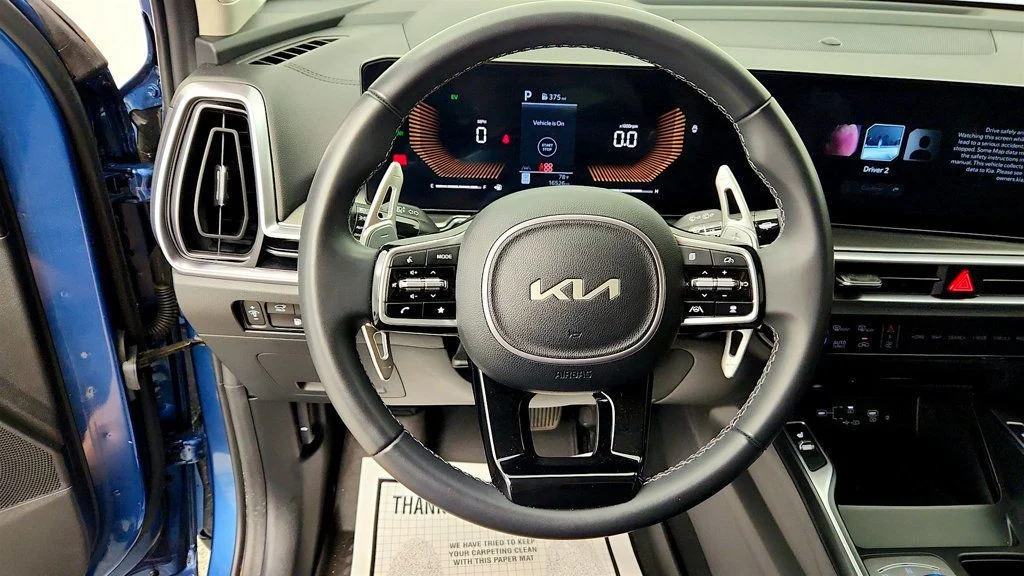 Used 2025 Mineral Blue Kia EX AWD image 14