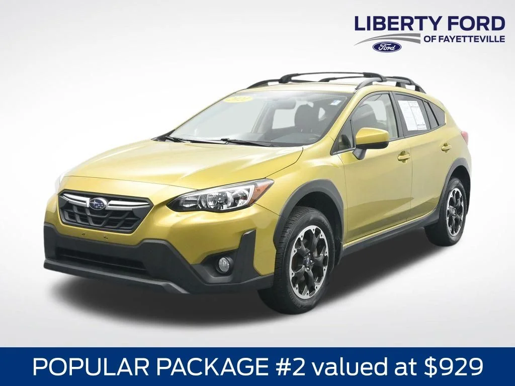 Used 2021 Plasma Yellow Pearl Subaru Premium image 1