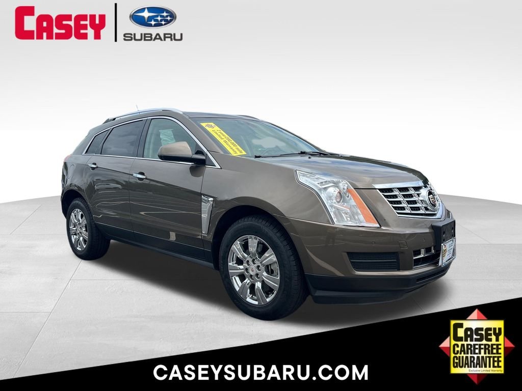 Used 2015 Mocha Metallic Cadillac Luxury image 1
