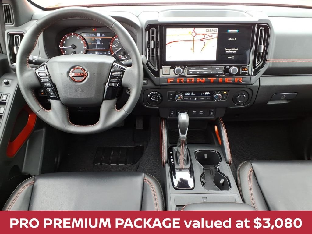 Used 2025 Afterburn Orange Nissan PRO-4X premium W/LEATHER, SUNROOF & ONLY 5k MILES! image 2