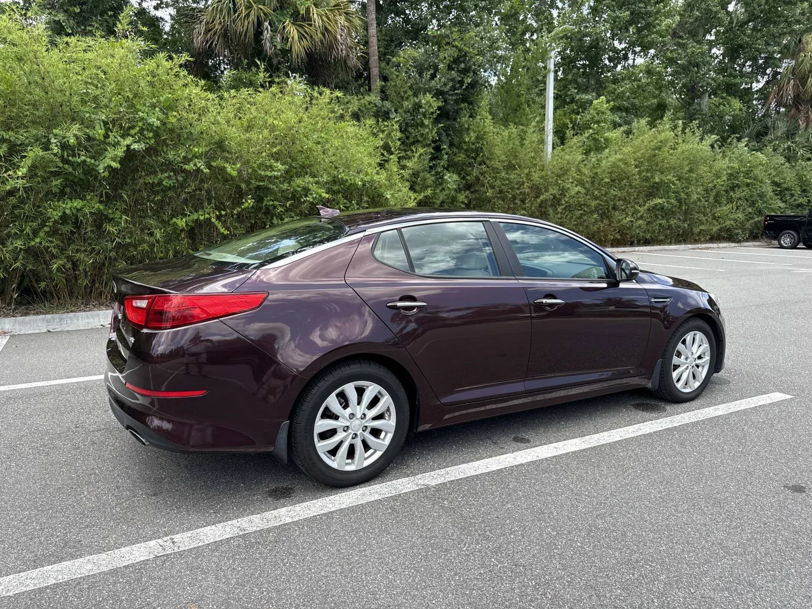 Used 2015 Kia Optima EX with VIN 5XXGN4A74FG486516 for sale in New Smyrna Beach, FL