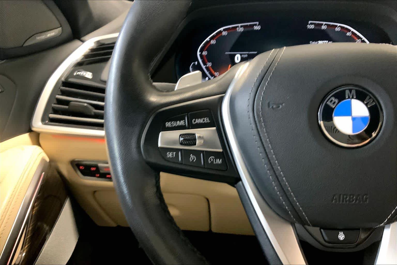Used 2021 Flamenco Red Metallic BMW xDrive40i image 23