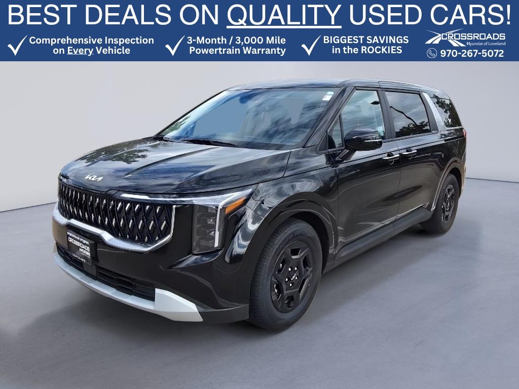Used 2025 Aurora Black Pearl Kia LXS image 1