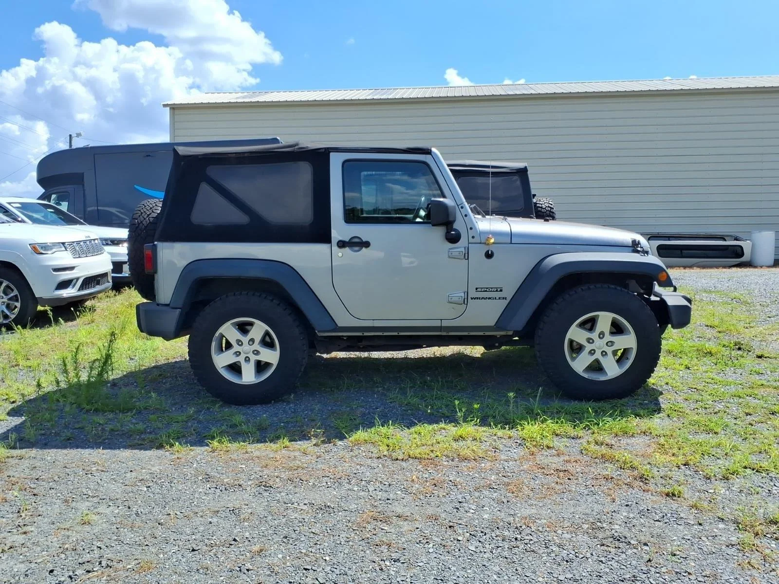 Used 2015 Billet Silver Metallic Clearcoat Jeep Sport image 9
