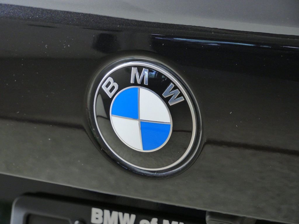 Certified Used 2024 Black Sapphire Metallic BMW xDrive40i image 14
