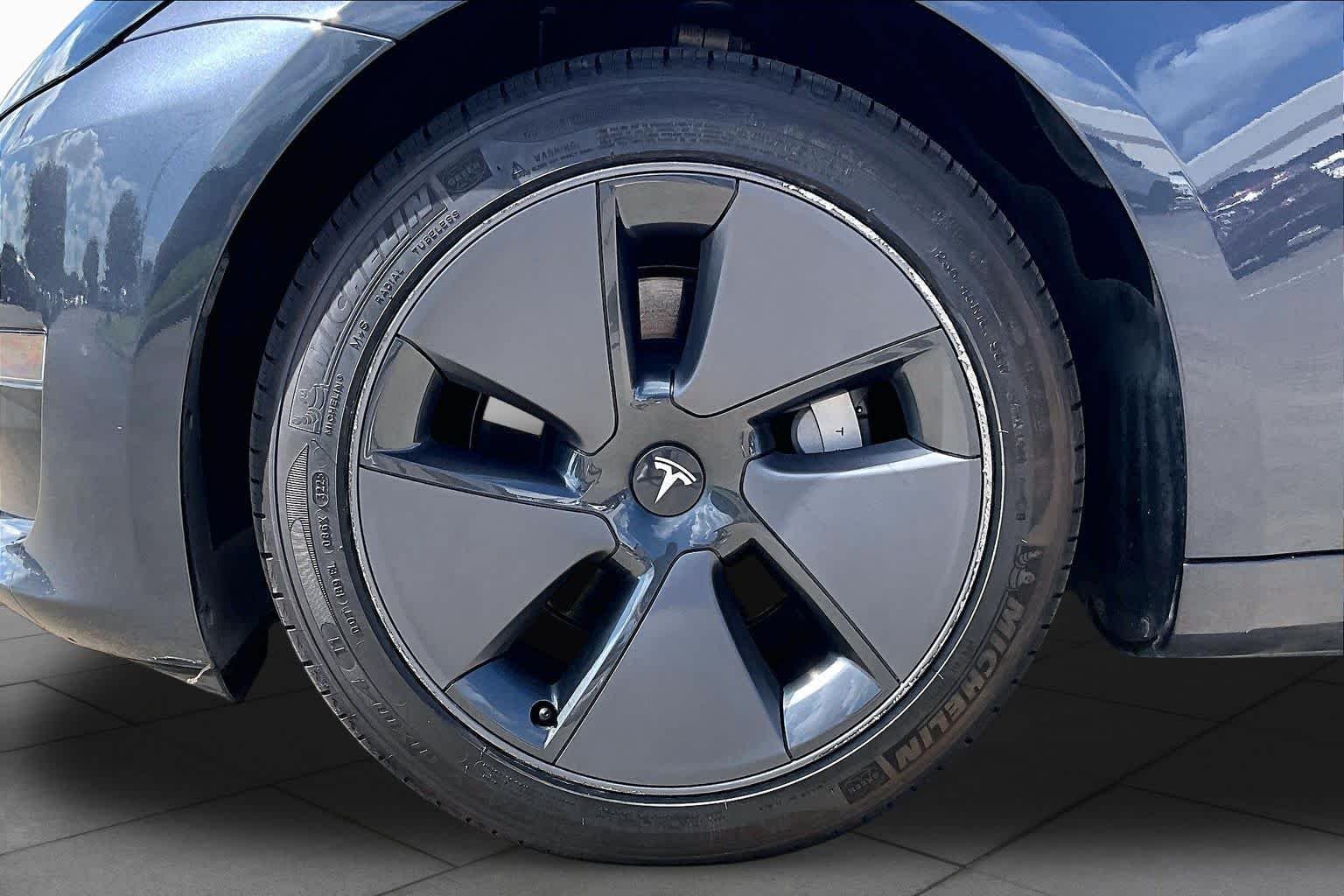 Used 2023 Solid Black Tesla  image 8