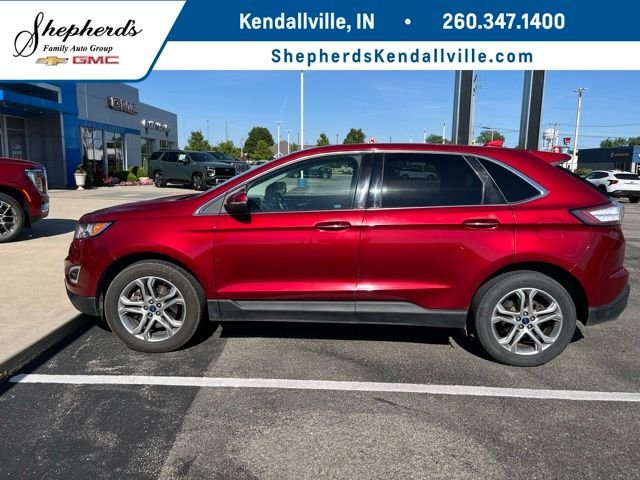 Used 2016 Red Ford Titanium image 1