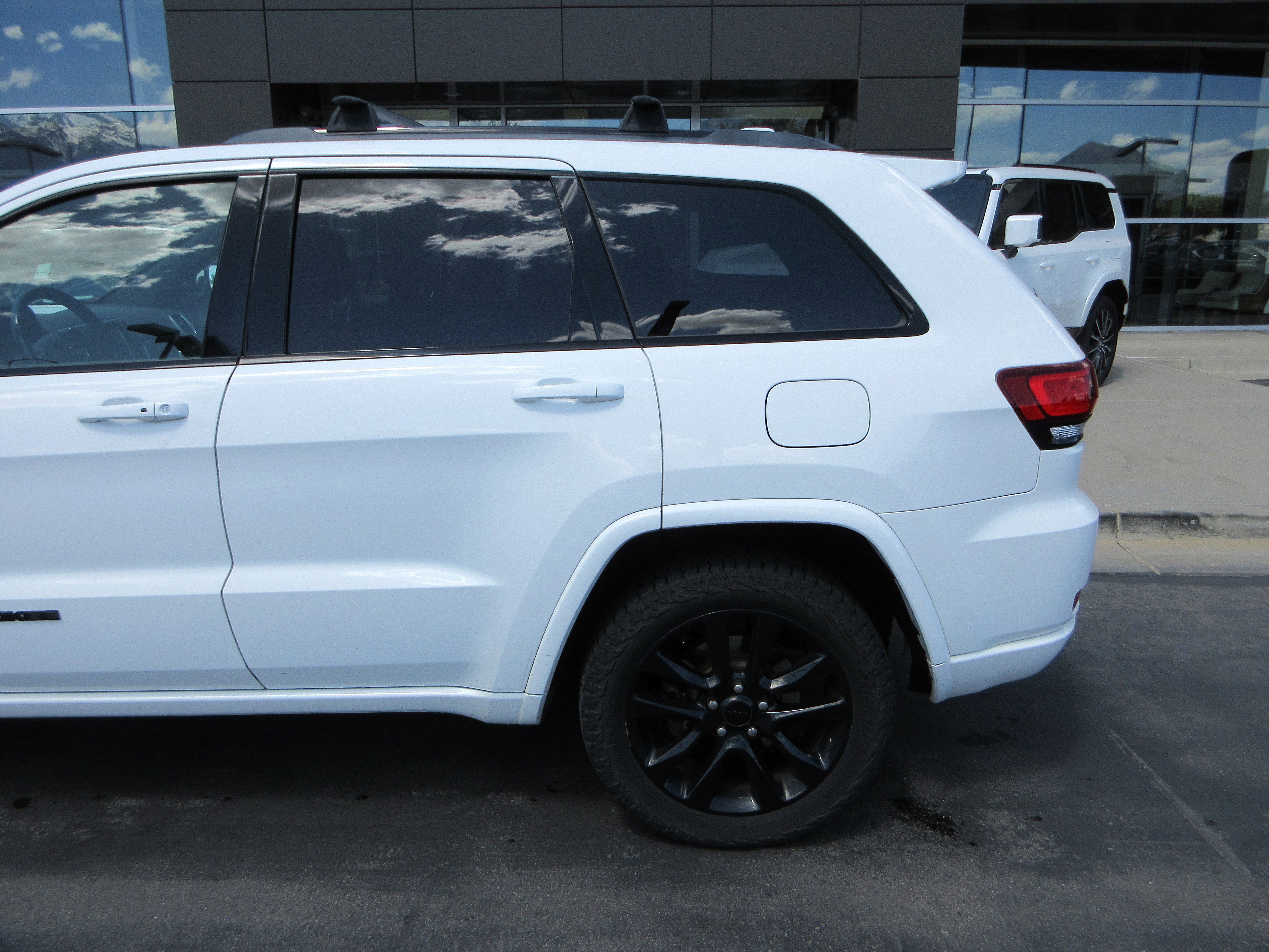 Used 2017 Bright White Clearcoat Jeep Altitude image 4