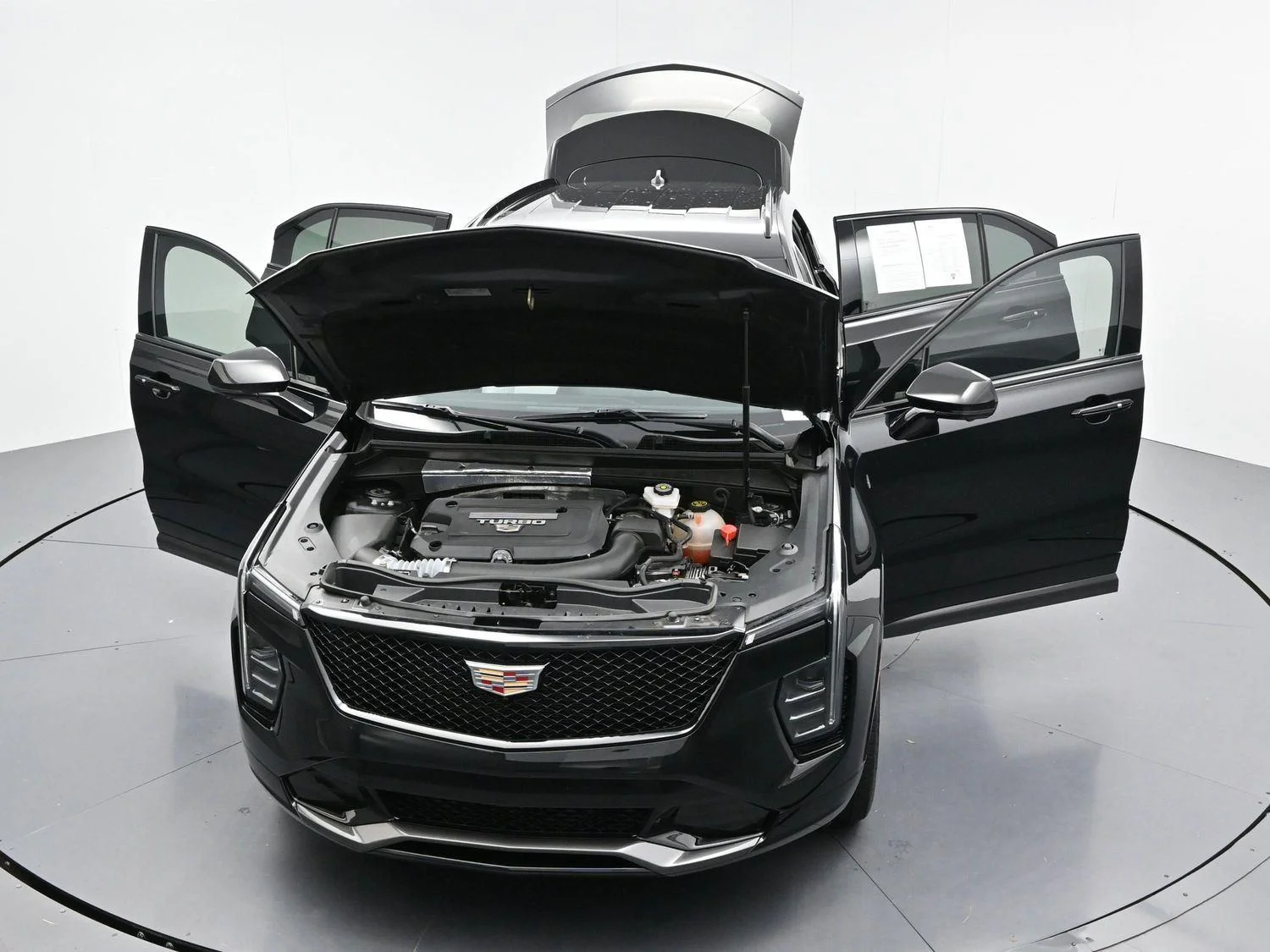 Used 2024 Stellar Black Metallic Cadillac Sport image 41