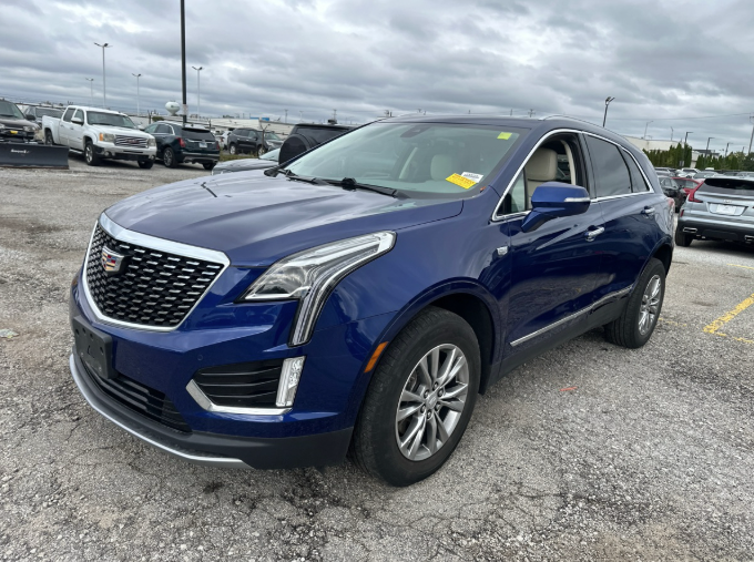 Used 2023 Blue Cadillac Premium Luxury image 1