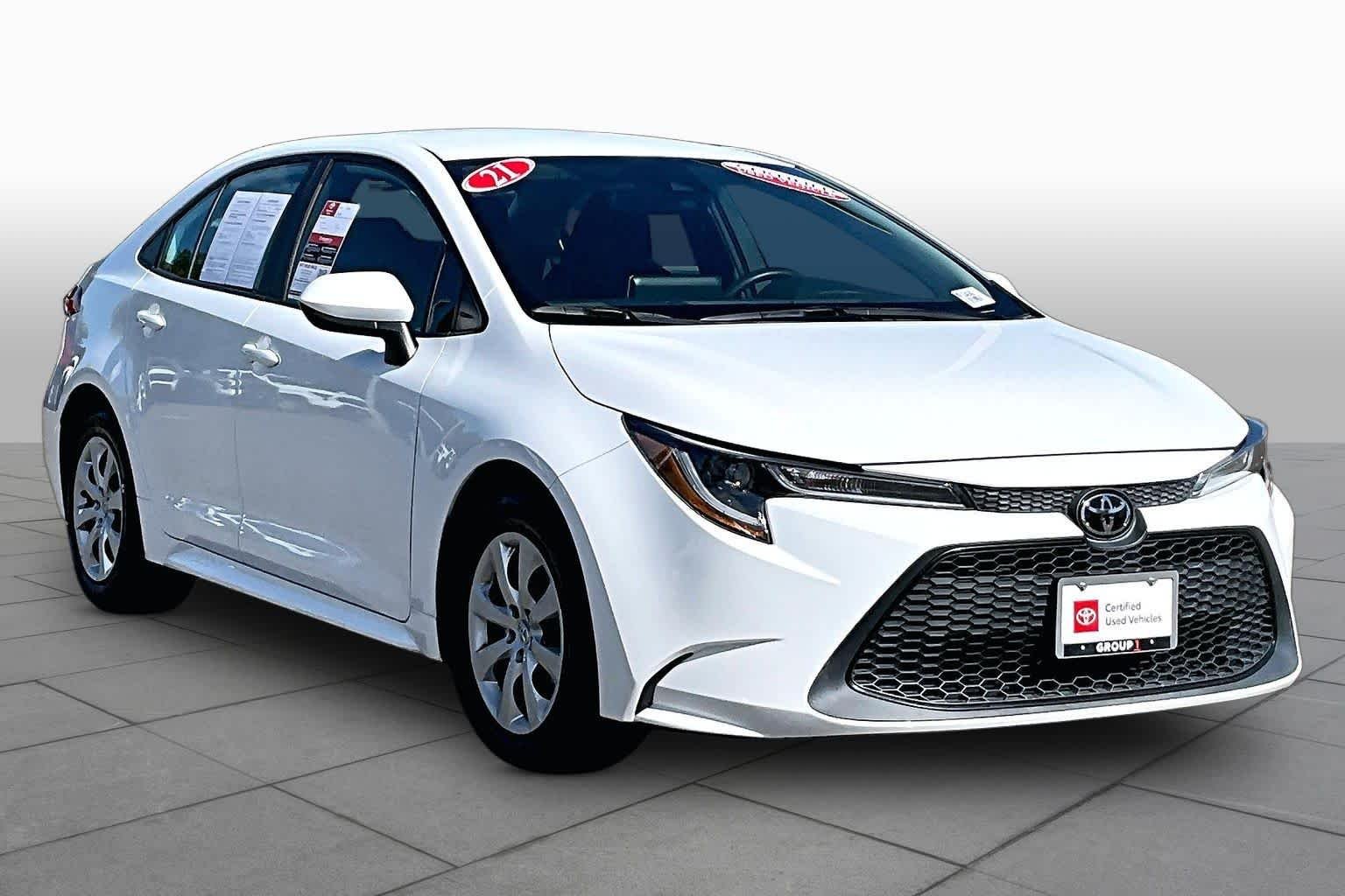 Certified Used 2021 Super White Toyota LE image 2