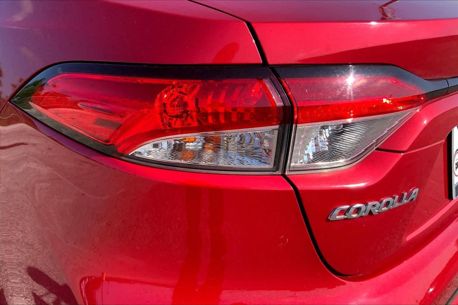 Used 2020 Barcelona Red Metallic Toyota LE image 28
